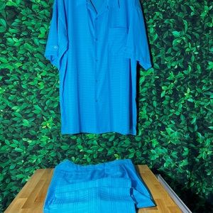 Men walking leisure suit tailored button down shirt open collar & pleated pants